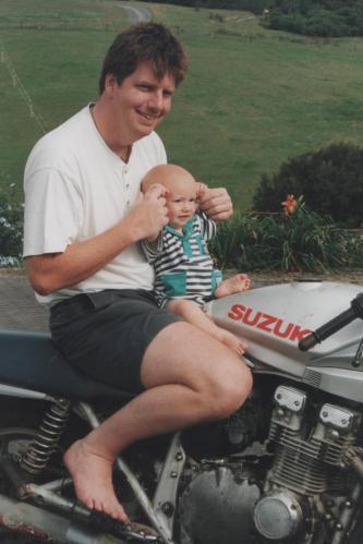Father and baby son sitting on Katana motorbike. Image: Su Leslie, 1999