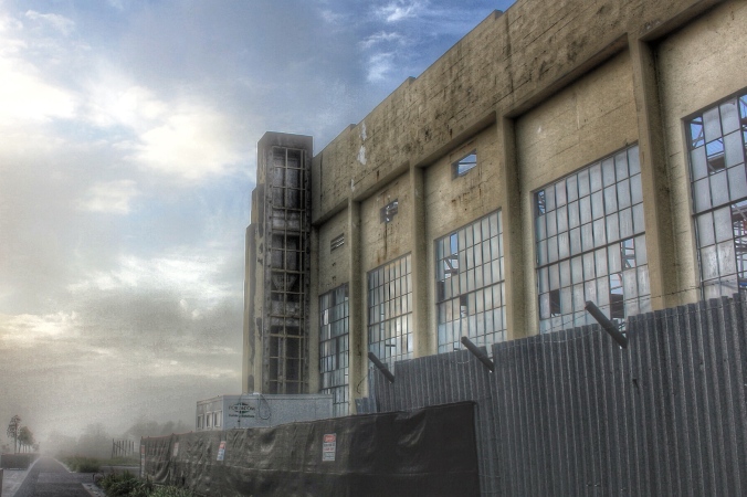 Morning mist. Disused hangar, Hobsonville Point, Auckland. Image: Su Leslie, 2016. Edited with Snapseed and Stackables.