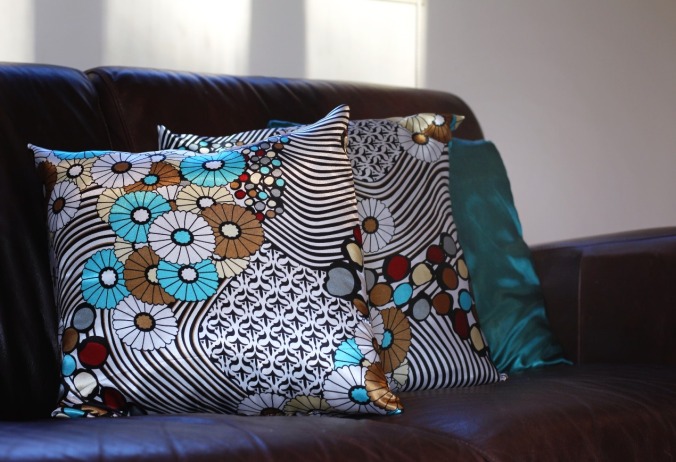 New scatter cushions for the living room. Black, white, turquoise and coffee fabric with floral pattern. Image: Su Leslie, 2016