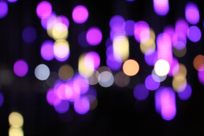 Nothing seems clear at the moment, but there is defintely light in the darkness. Bokeh; pink, purple and yellow against a black background. Image: Su Leslie, 2016