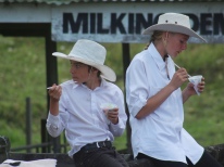 Brother and sister; enjoying shave ice at Helensville A&P Show, NZ. Image: Su Leslie, 2017.
