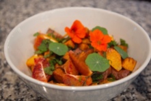 Sweet potato and blood orange salad with nasturtium. Image: Su Leslie 2019