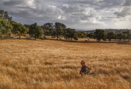 Girl in a field. Cornwall Park, Auckland. Image: Su Leslie 2020